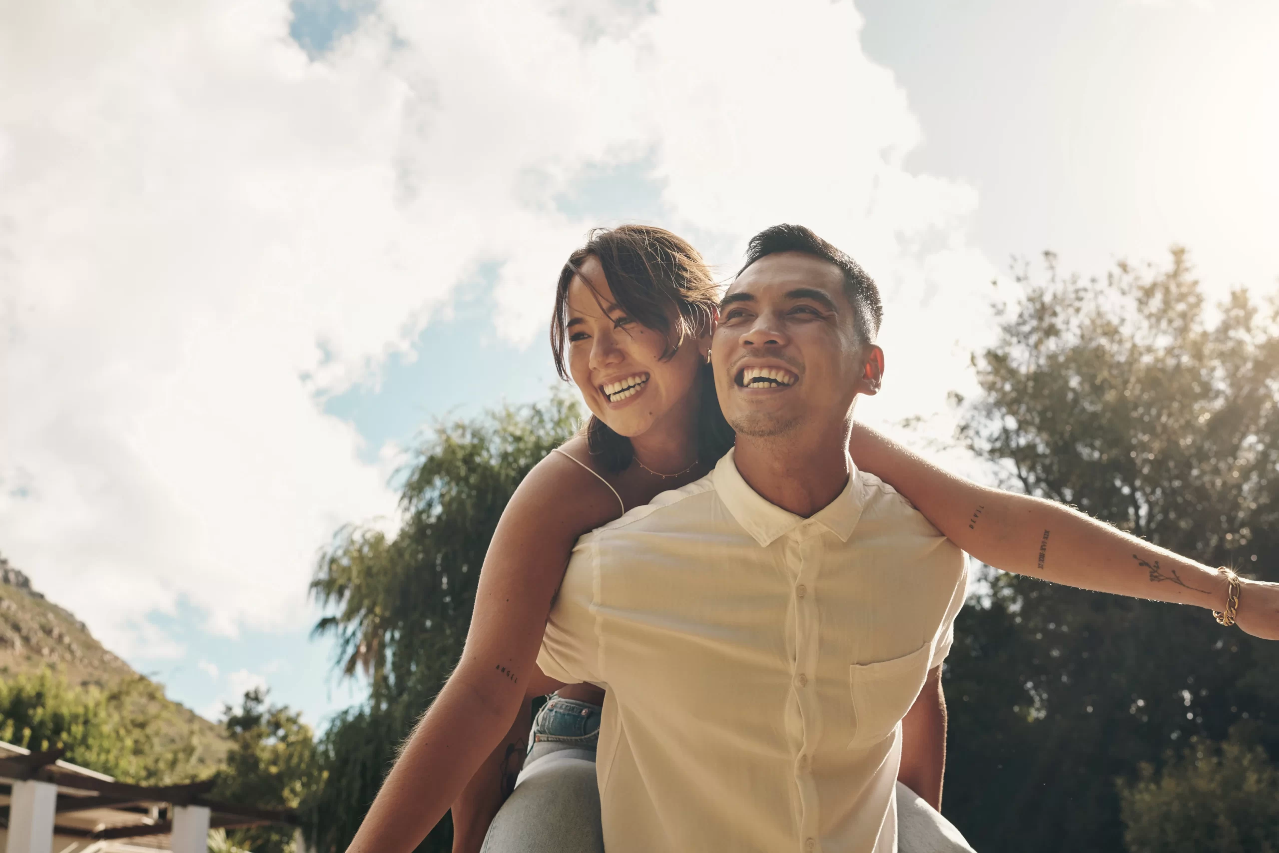 Two people exercising together outdoors